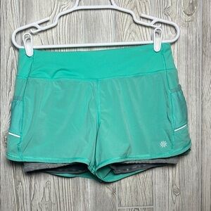 Women Athleta Ready Set Go 2 in 1 Running Teal Shorts Athleisure Women's Small